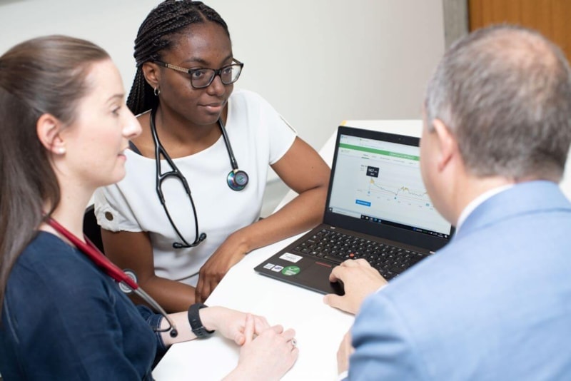 team working at laptop